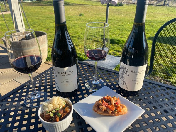 image of beef bourguignon next to a bottle of Shadow Ranch Syrah and bruschetta next to a bottle of Shadow Ranch cotes du ombre